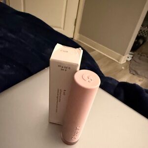 Luxurious berry lip Creme by Glossier color Tempo